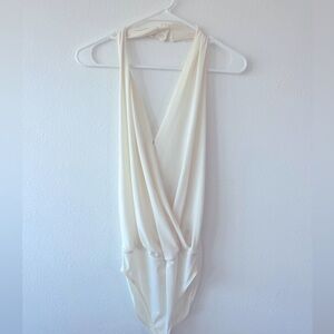 Deep Plunge Cream Bodysuit from EXPRESS